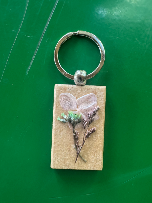 Pressed flower on wood; metal keychain silver